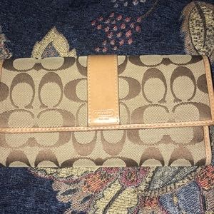 A brown coach wallet!